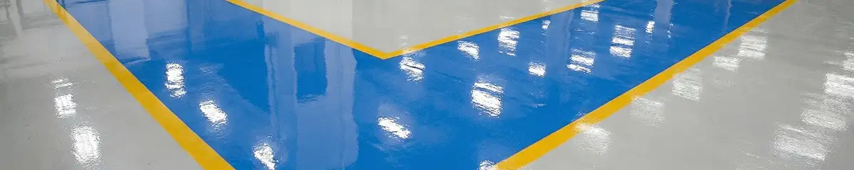 A factory floor professionally covered and marked with epoxy flooring in Columbus, GA