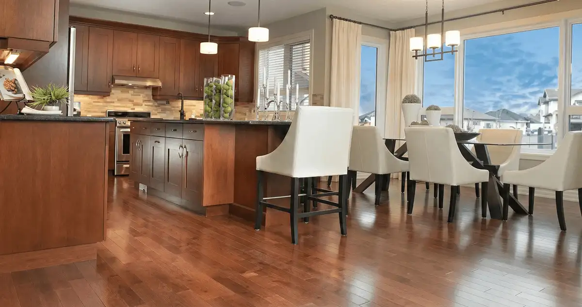 A modern kitchen with professionally installed wood flooring in Columbus, GA