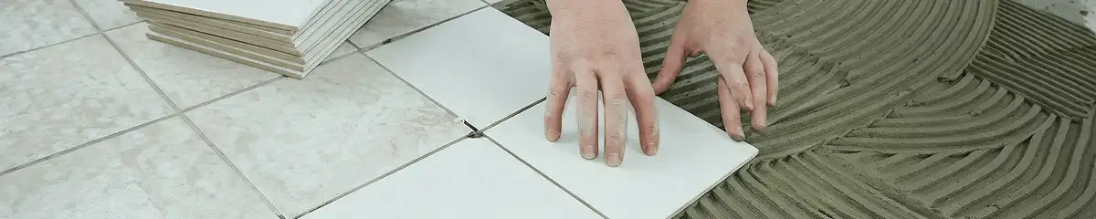 Professional installing white tile floors in Columbus, GA