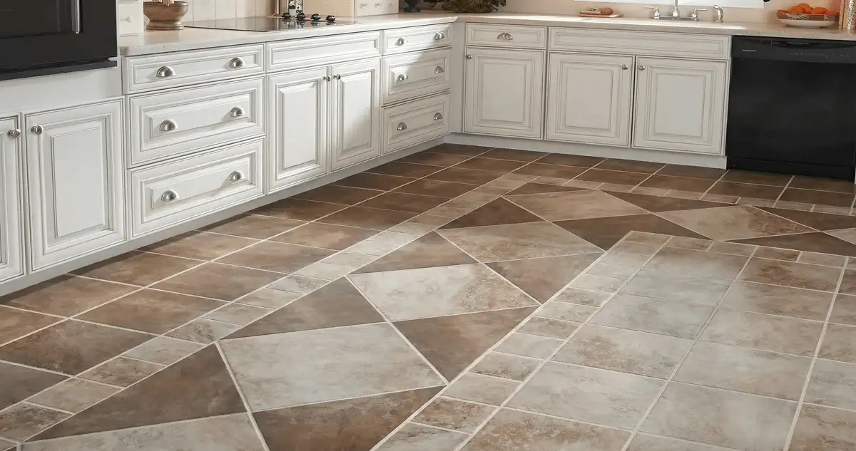 Kitchen with white cabinets and a professionally installed tile floor in Columbus, GA